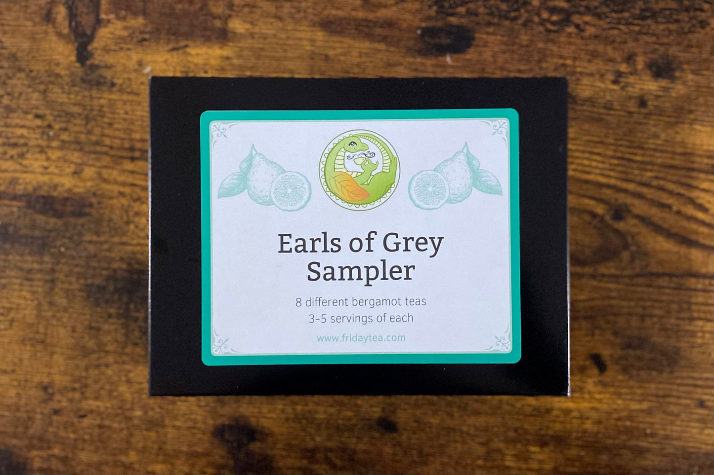 Closed box with label reading "Earls of Grey Sampler: 8 different bergamot teas, 3-5 servings of each