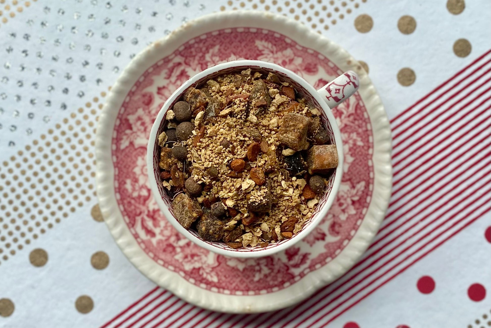 Teacup full of spices and fruit